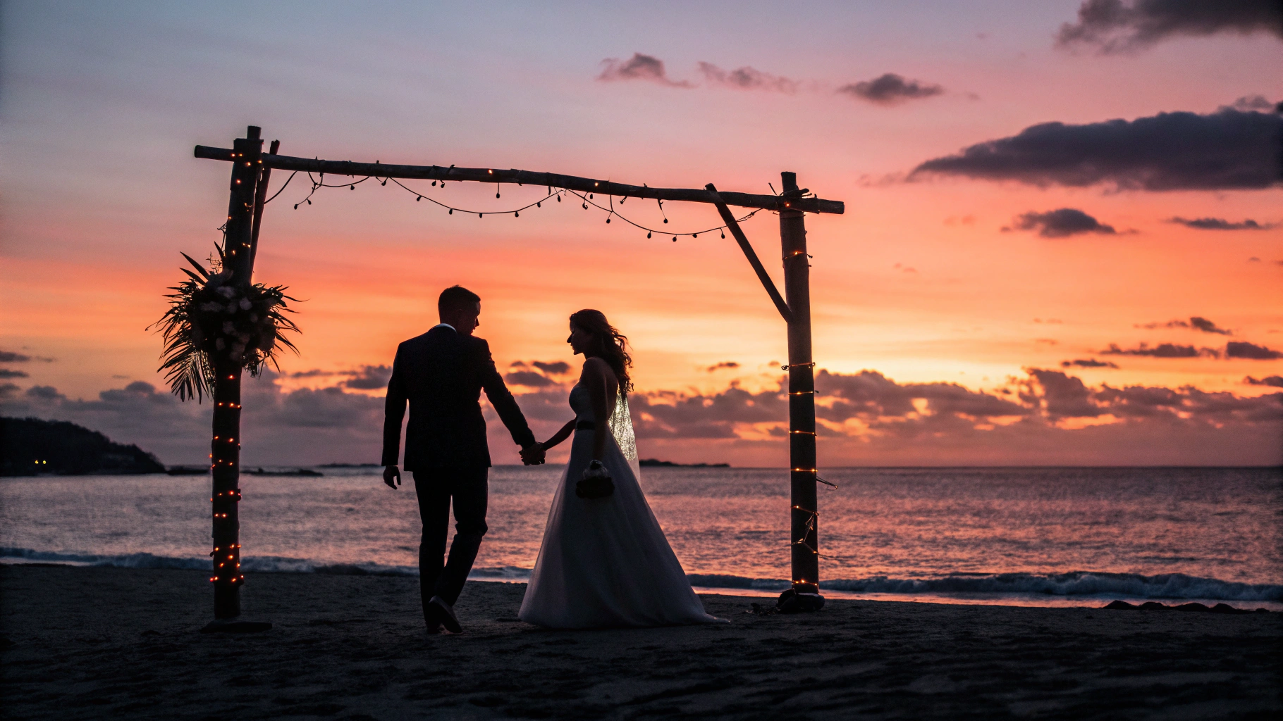 Bride and groom walking along historic waterfront promenade at evening dusk